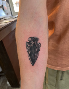 dagger on arm tattoo