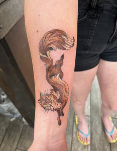 fox on forearm tattoo