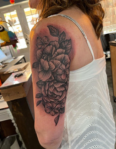 hawaiian flowers tattoo