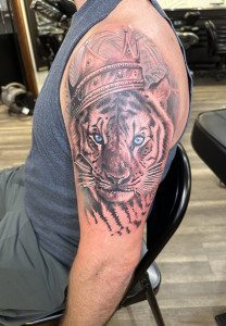 lion with crown tattoo