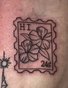 hawaian stamp tattoo